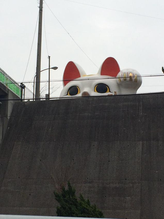 Illustration for article titled Attack on Giant Lucky Cat